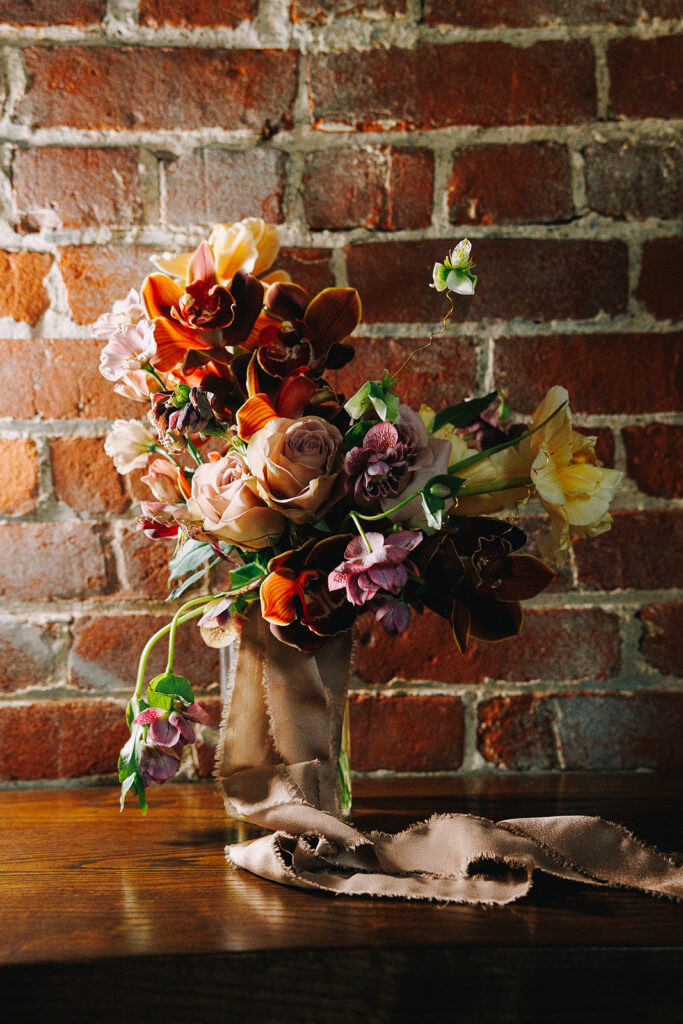 Bridal Bouquet sitting in vase designed by Fiori Florals Design Studio. Photograph by Derks Werks.
Columbus Ohio Wedding Florist