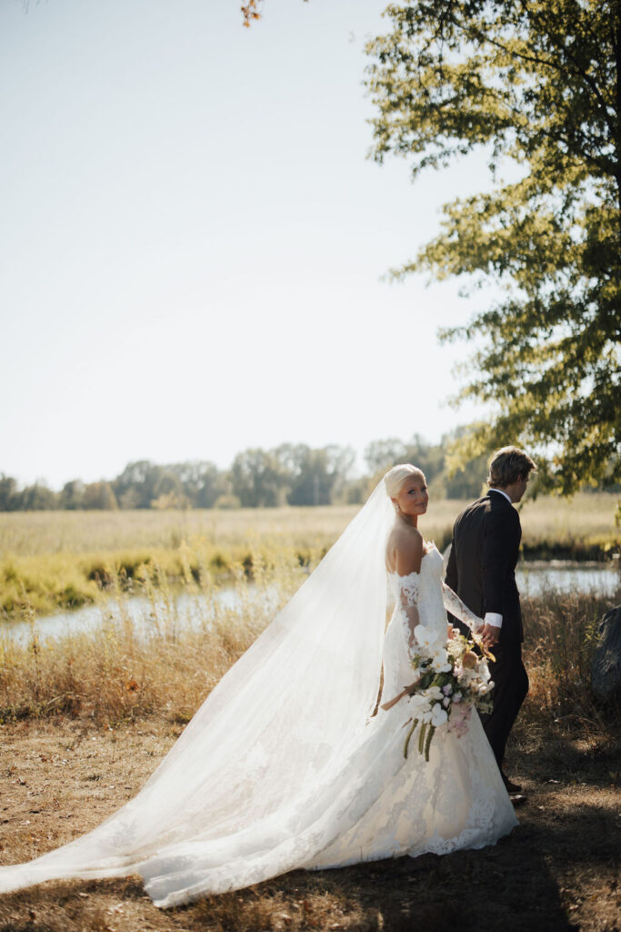 Photograph by Pictures by Ash, Bride holding bouquet designed by Columbus Wedding Florist Fiori Florals