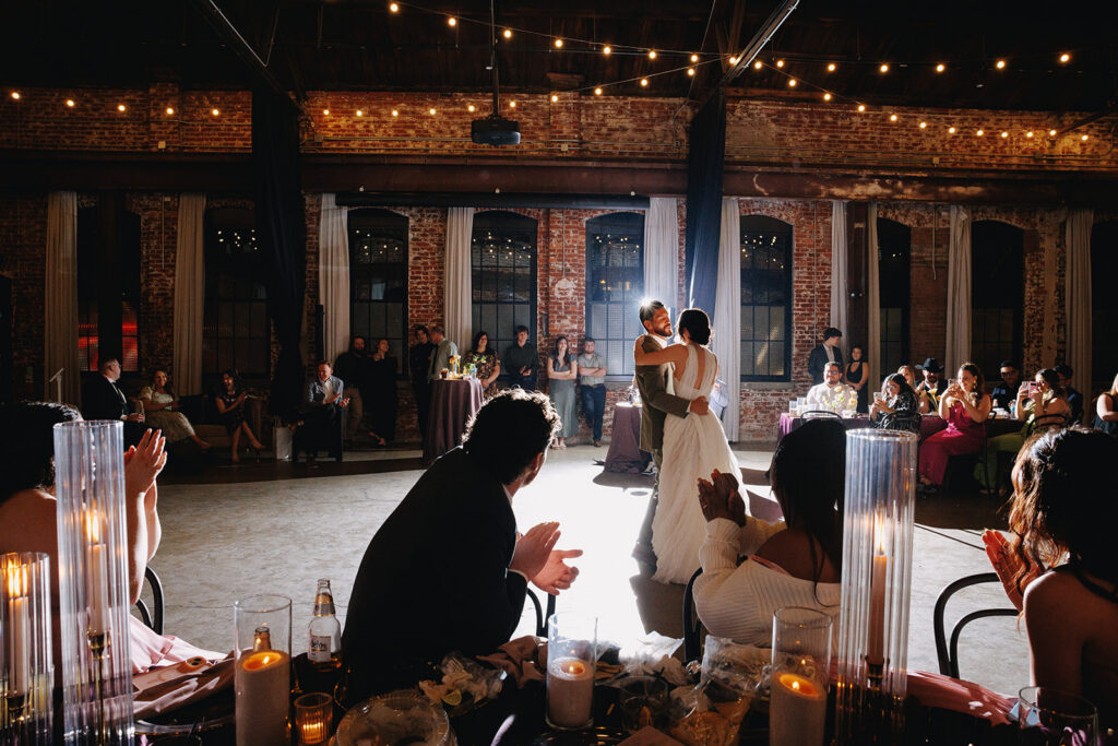 Bride and Groom First dance with dramatic lighting photographed by Derks Works